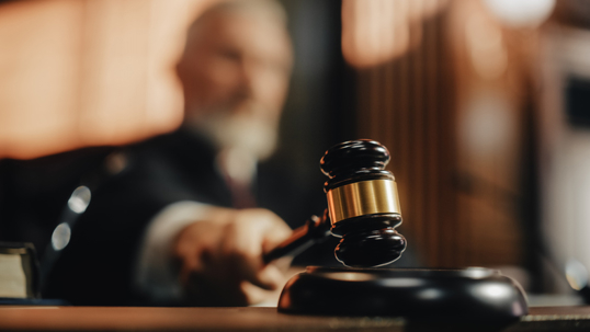 Judge hitting gavel